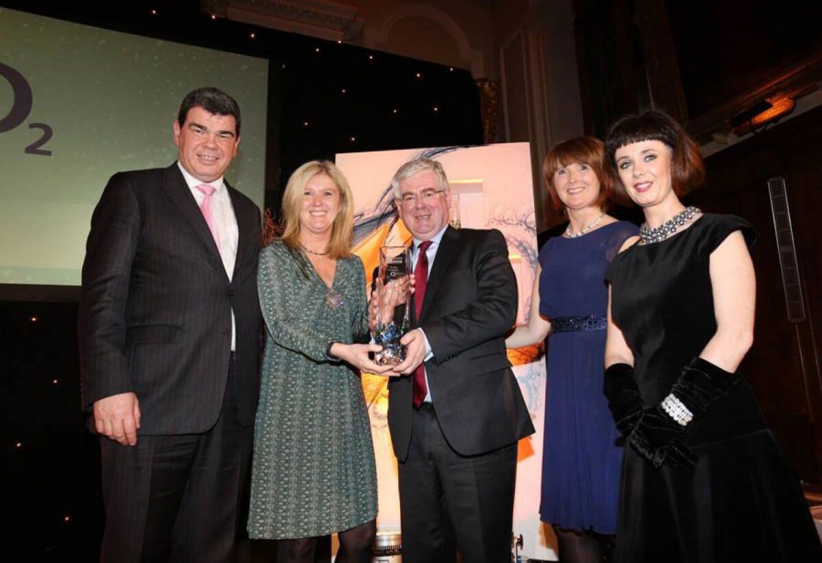 Mary McKenna receiving an award